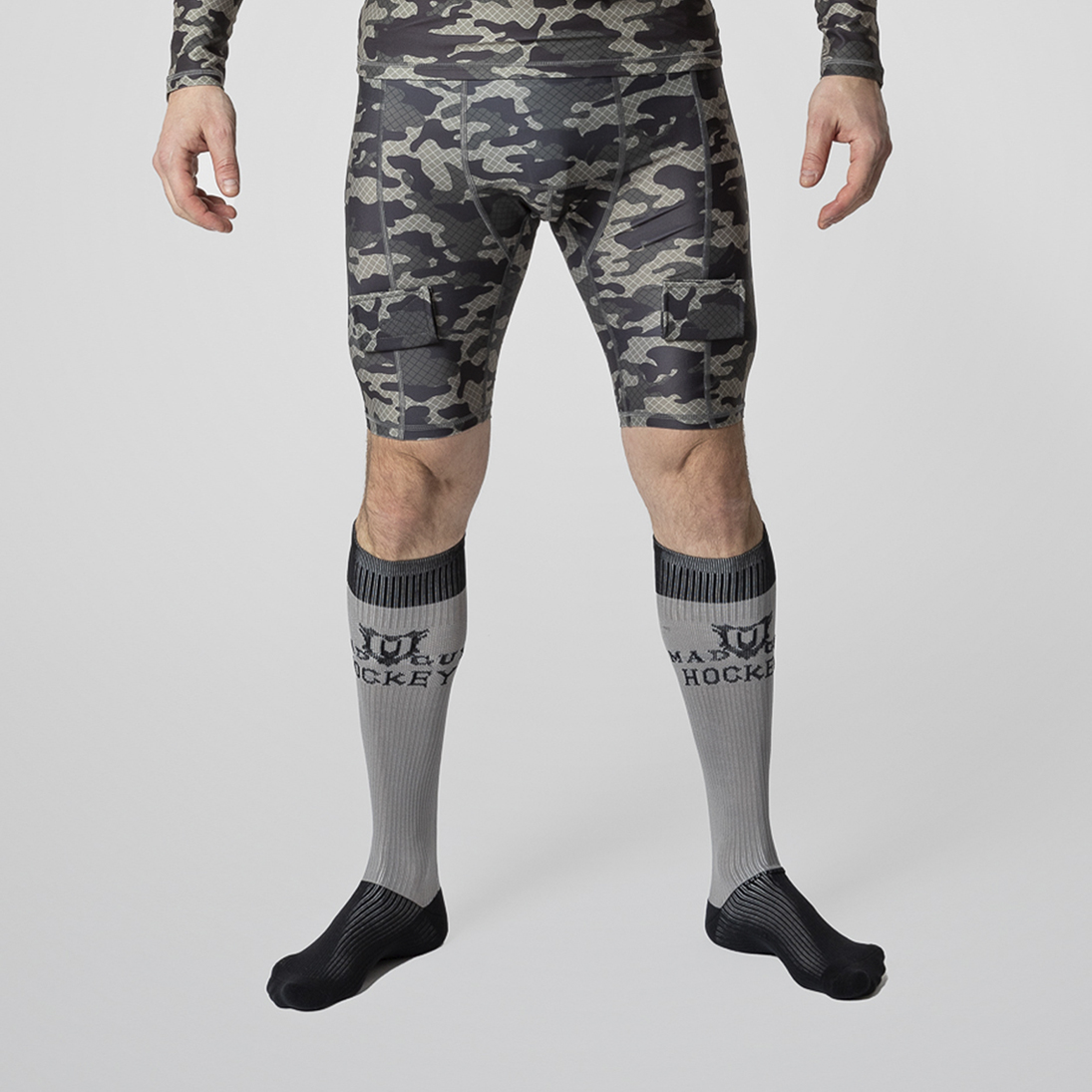 Шорты с защитной пластиковой раковиной Mad Guy Camo-Line SR net\коричневый